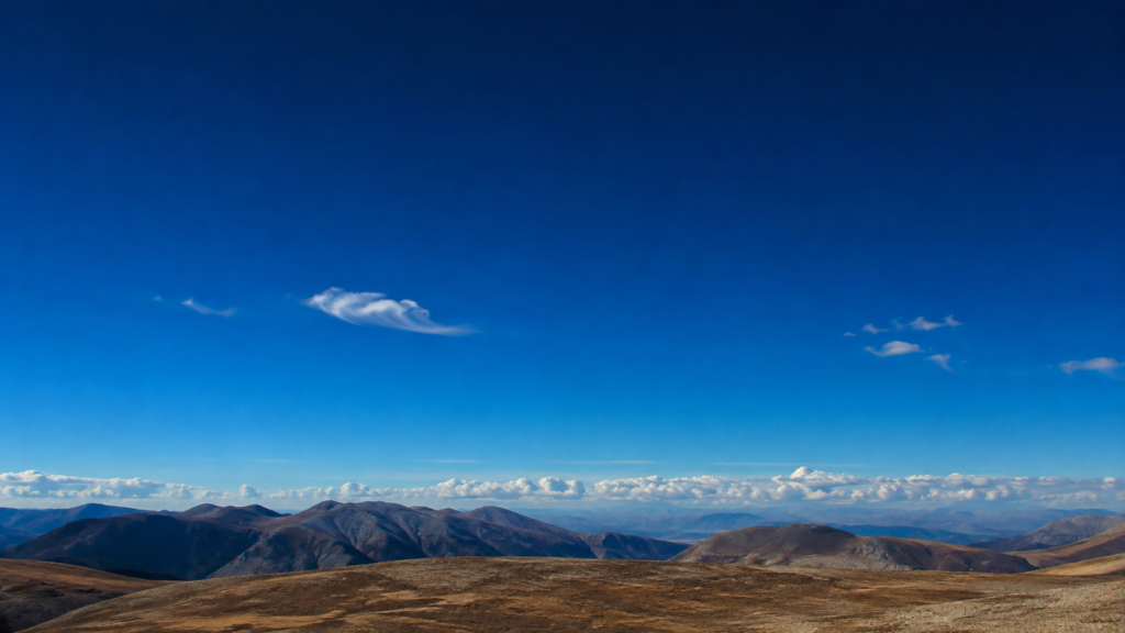 Clear blue daytime sky showing atmospheric scattering.